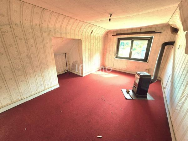 Maison à rénover de 109.79 m2 habitables à Baerenthal.