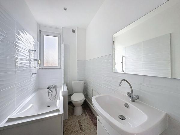 Appartement 3 pièces 56 m² avec balcon, 2 chambres et cuisine équipée 4eme étage