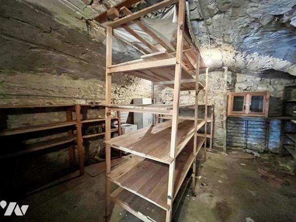 Maison de village avec cour, jardin, garage et dépendances à Saint Nazaire