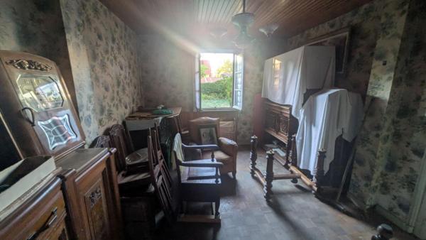 Petite maison près du centre à rénover avec jardin