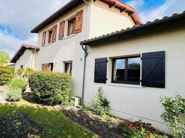 Grande maison familiale à Eysines avec jardin et garage.