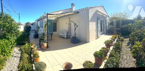 Dans lieu calme et non isolé, jolie maison récente de plain-pied avec garage et jardin clos
