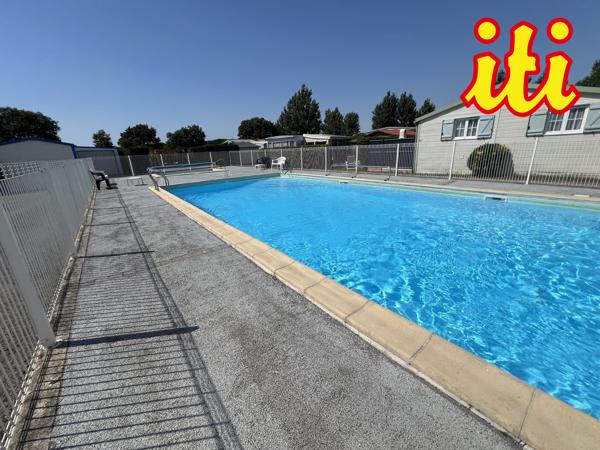 Mobil-home sur parcelle privative de 202 m²