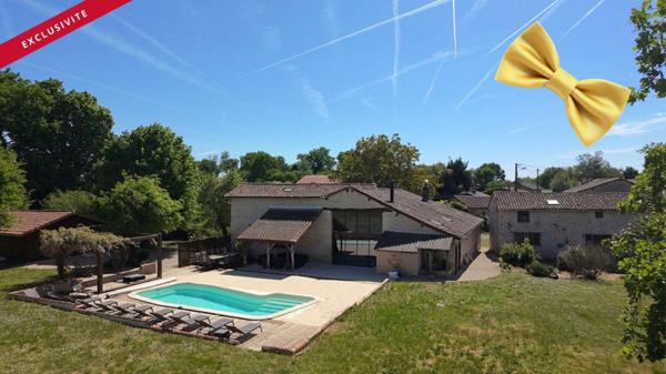 Maison d'Exception à Vendre à Champniers - 295 m² sur Terrain de 4700 m² avec Piscine