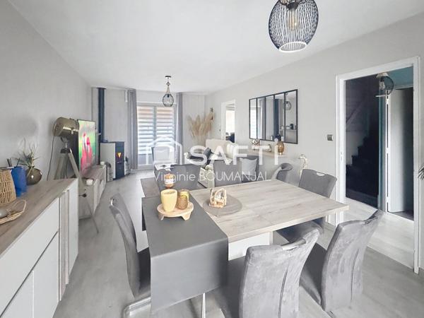 Maison semi-mitoyenne 3-4 chambres avec garage.