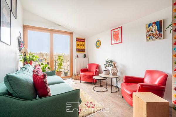 Appartement d’architecte au dernier étage avec balcon