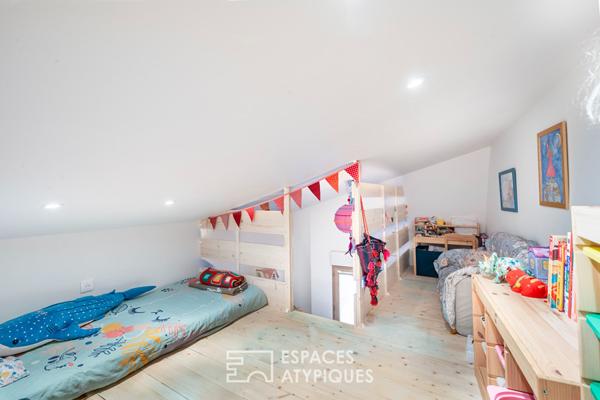 Appartement d’architecte au dernier étage avec balcon