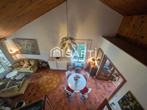 maison d'architecte de 1970 , chaleureuse très familiale et conviviale ouverte avec véranda sur terrasse et jardin intime