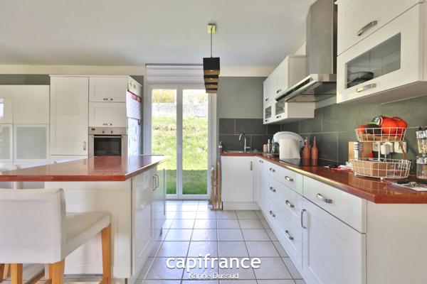 Coup de cœur assuré : Maison 135 m² avec jardin, garage double et suite parentale — Sainte-Catherine (69)