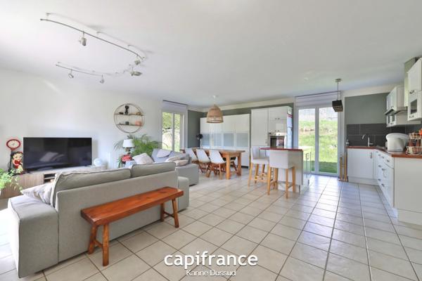 Coup de cœur assuré : Maison 135 m² avec jardin, garage double et suite parentale — Sainte-Catherine (69)