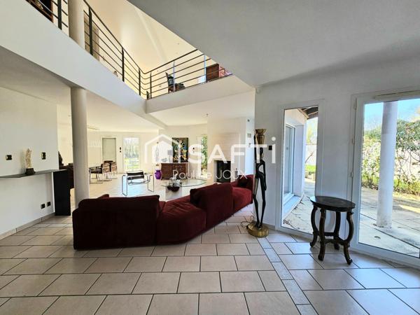 Maison individuelle 375m2 avec garage et terrain arboré