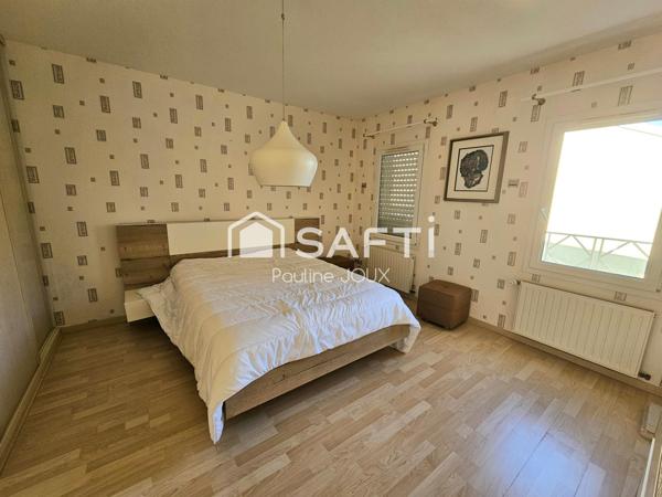 Maison individuelle 375m2 avec garage et terrain arboré