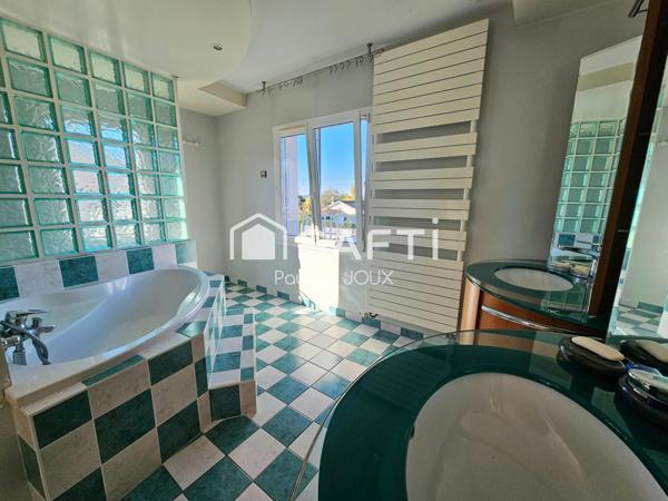 Maison individuelle 375m2 avec garage et terrain arboré