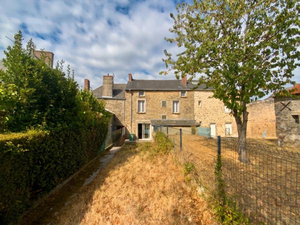 Maison 130 m² à rénover avec terrain constructible et divisible