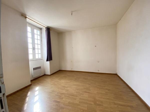 Maison 130 m² à rénover avec terrain constructible et divisible