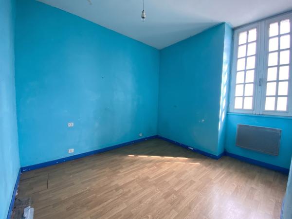 Maison 130 m² à rénover avec terrain constructible et divisible