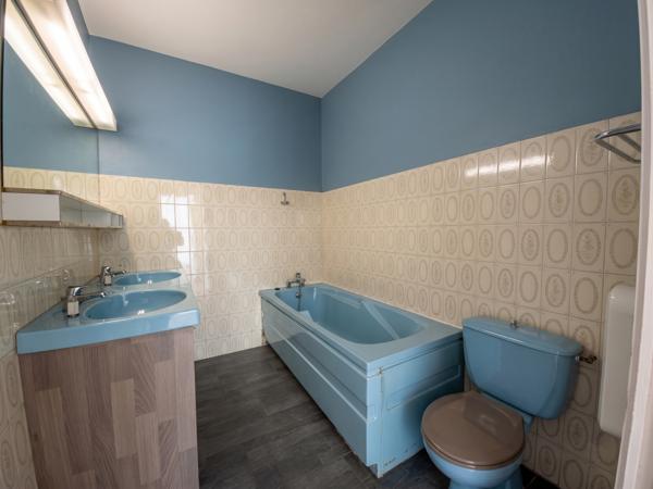 Maison 130 m² à rénover avec terrain constructible et divisible
