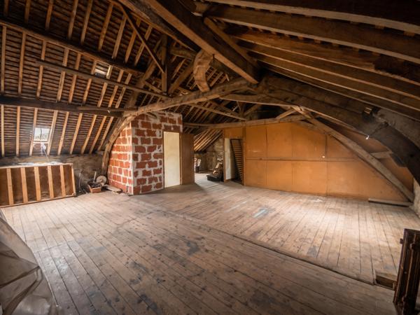 Maison 130 m² à rénover avec terrain constructible et divisible