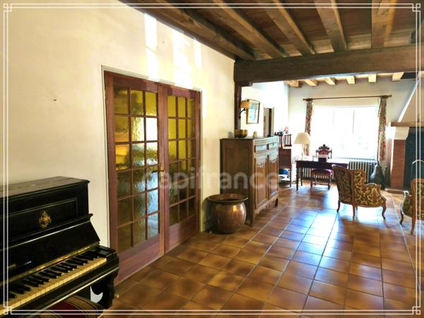 Ensemble immobilier de caractère avec fort potentiel – Maison de 305 m² + revenus locatifs