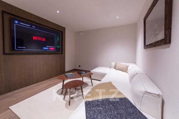 Chalet contemporain face aux montagnes