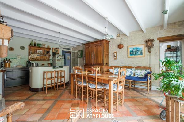 Maison ancienne rénovée et son jardin au fil du Mignon