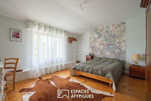 Maison ancienne rénovée et son jardin au fil du Mignon