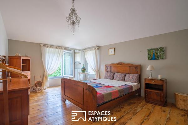 Maison ancienne rénovée et son jardin au fil du Mignon