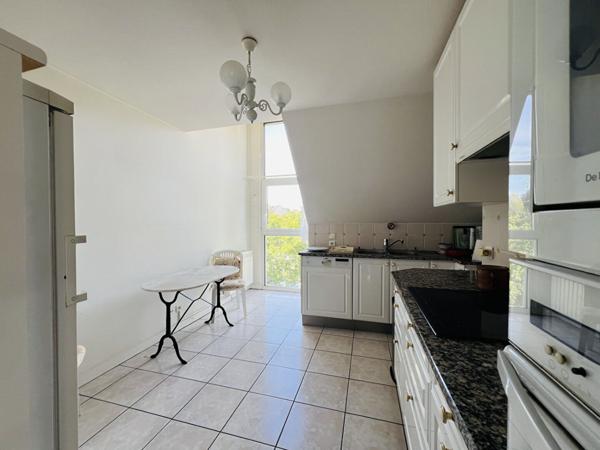 Appartement 4 pièce(s) 3 chambre(s) 116.7 m²