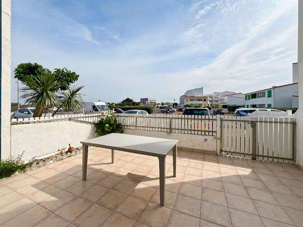 Appartement en rez-de-jardin avec une terrasse de 20m²