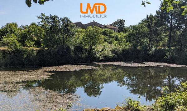 Propriété en pierre 430m2 avec 9ha de terres attenantes et lac