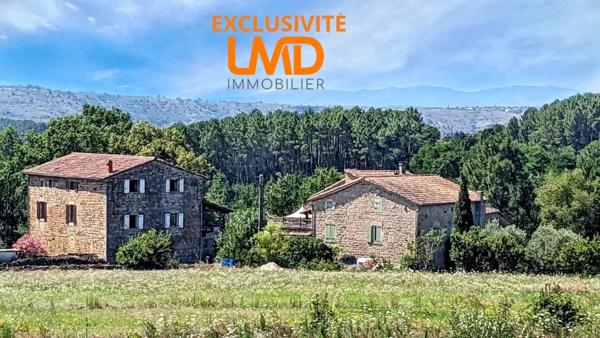 Propriété en pierre 430m2 avec 9ha de terres attenantes et lac