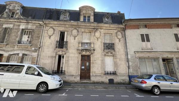 Maison d'habitation mitoyenne