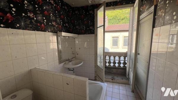Maison d'habitation mitoyenne