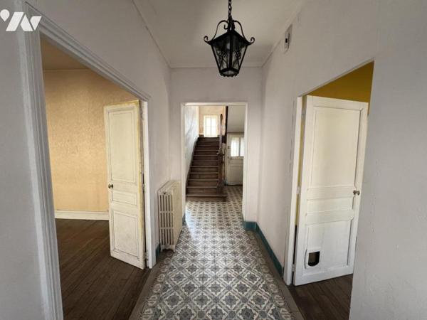 Maison d'habitation mitoyenne