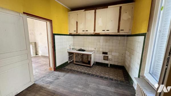 Maison d'habitation mitoyenne