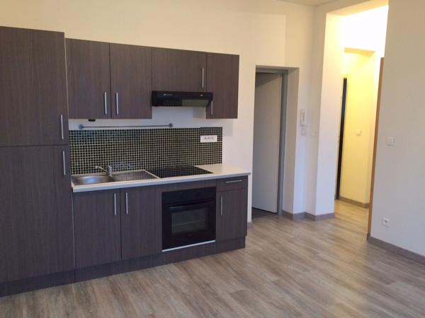 Bel immeuble de 7 appartements avec 12 parking et local vélo