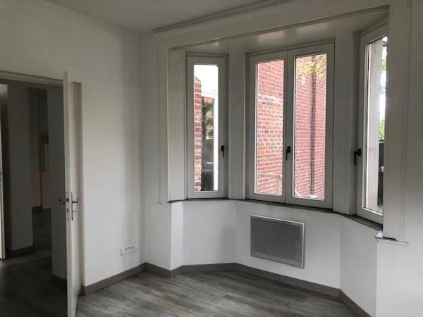 Bel immeuble de 7 appartements avec 12 parking et local vélo