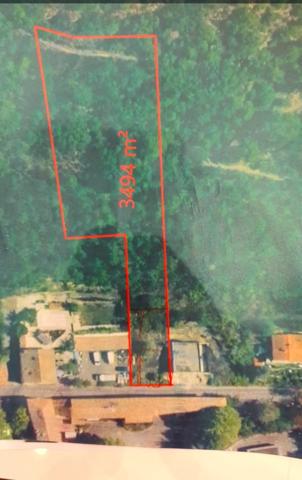 Tout près du centre ville terrain de 3494m2 constitué par trois parcelles dont une pouvant être bâtie de 386m2