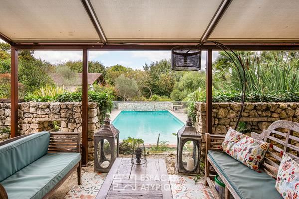 Ensemble immobilier de caractère et son parc paysagé avec piscine