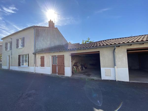 Maison avec jardin et garages au Dorat!