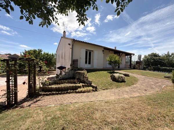 Charmante maison de plain-pied avec garage et jardin clos