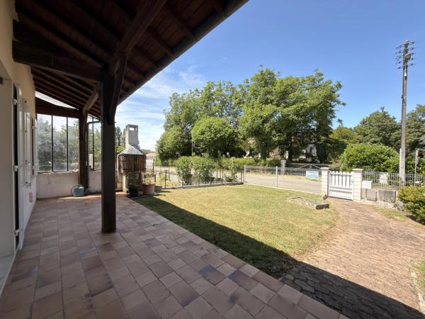 Charmante maison de plain-pied avec garage et jardin clos