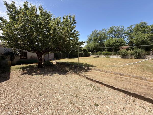 Charmante maison de plain-pied avec garage et jardin clos