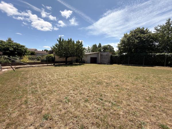 Charmante maison de plain-pied avec garage et jardin clos