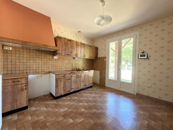 Charmante maison de plain-pied avec garage et jardin clos