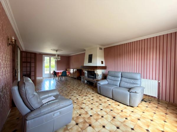 Charmante maison de plain-pied avec garage et jardin clos