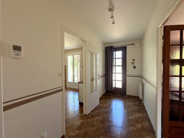 Charmante maison de plain-pied avec garage et jardin clos