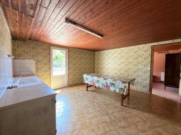 Charmante maison de plain-pied avec garage et jardin clos
