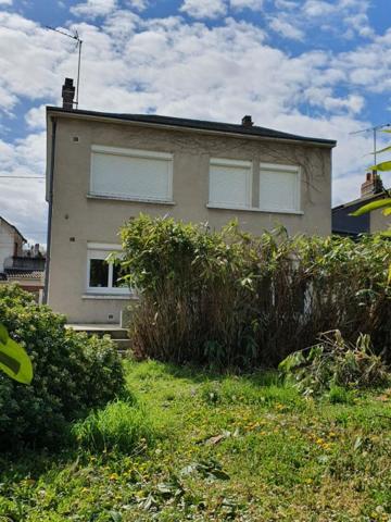 Maison de ville 150 m2 4 chambres + garage + parking + jardin