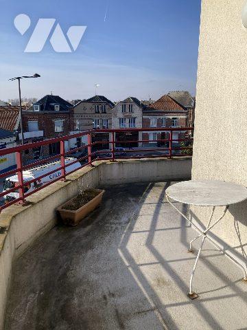 Appartement en centre ville avec ascenseur, terrasse garage et cave